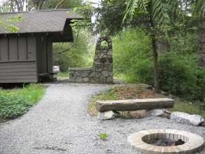 Cabin at Camp Long Showing Fire Place and Fire Pit